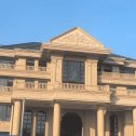 巴中黄金麻别墅外墙干挂石材效果示例