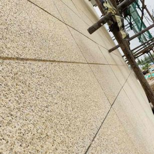 巴中 黄金麻花岗岩荔枝面外墙干挂石材效果示例