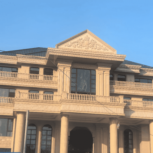 巴中黄金麻别墅外墙干挂石材效果示例