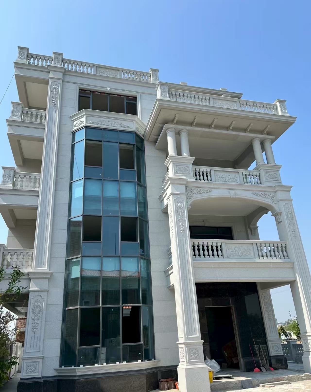 巴中 白麻花岗岩别墅外墙干挂效果展示